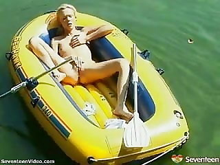 Adorable barely legal teen rubs one out on a raft